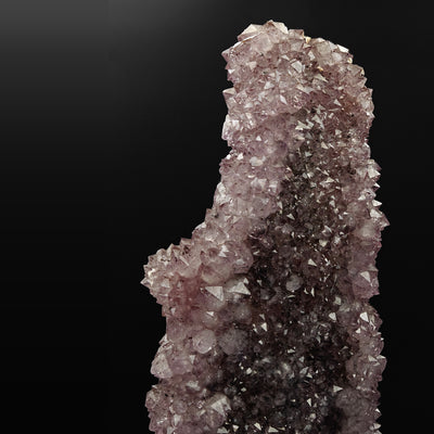 Detail of Amethyst crystal cluster showing color zoning from pale to deep purple