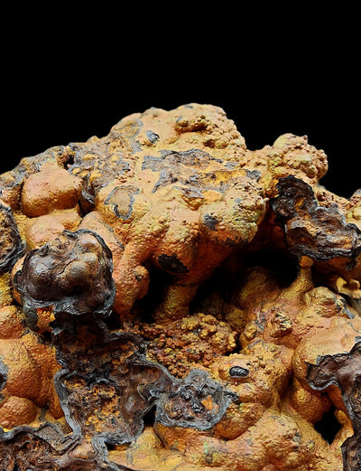 Close-up view of botryoidal goethite micro-crystals with submetallic black zones