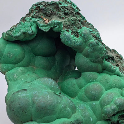 Close-up of botryoidal malachite surface showing microcrystalline texture