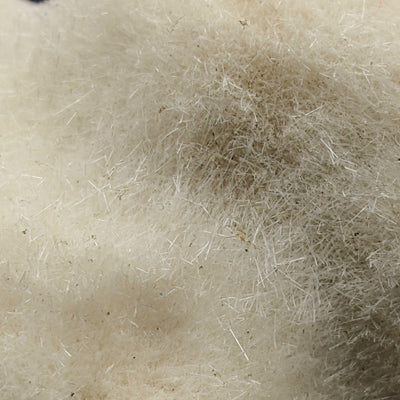 Detail of acicular mesolite crystals with subtle color variation across the mantle