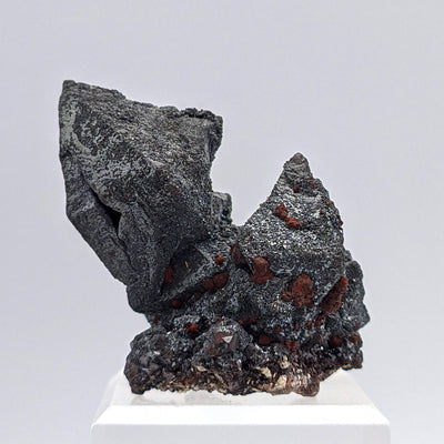Side view of Martite pseudomorph cluster showing stepped octahedral faces, Mendoza, Argentina