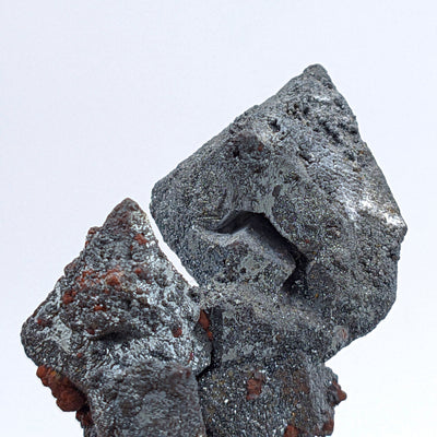 Detail of hollow window structure in hematite octahedron after magnetite