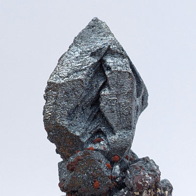 Full specimen view of silvery hematite pseudomorph after magnetite, Payún Matrú, Argentina