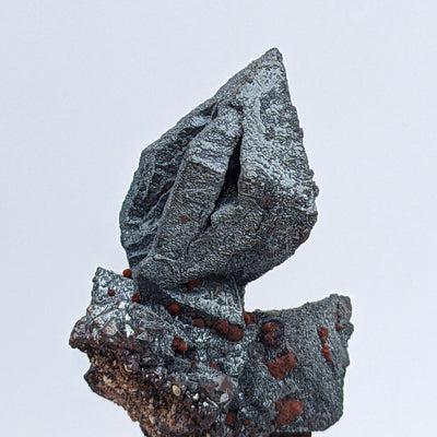 Silvery hematite octahedron with hollow skeletal growth from Payún Matrú volcano