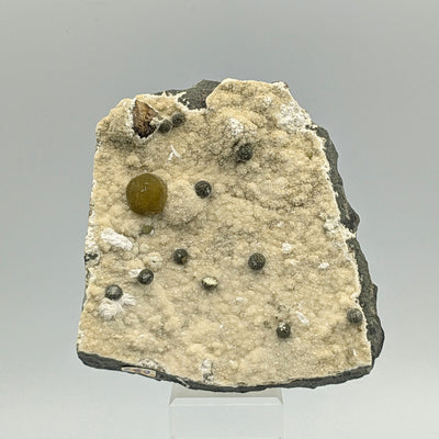 Full specimen of Gyrolite sphere and satellite balls on zeolite matrix, Pune, India