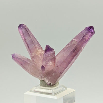 Frontal view of violet-pink amethyst crystal cluster on matrix, Piedra Parada, Veracruz, Mexico