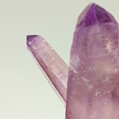 Close-up of amethyst crystal termination beside larger prism, Piedra Parada, Veracruz, Mexico