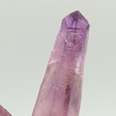 Macro view of a single elongated amethyst crystal, Piedra Parada, Veracruz, Mexico