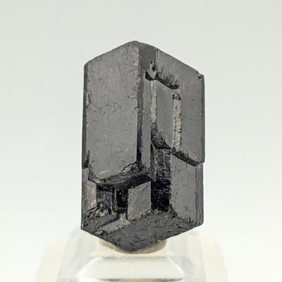 Termination face of Schorl tourmaline crystal showing triangular pyramidal form