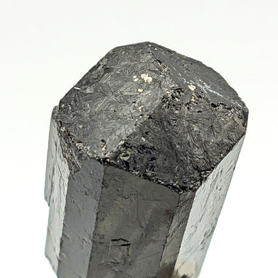 Close-up of Schorl crystal termination showing striated prism faces
