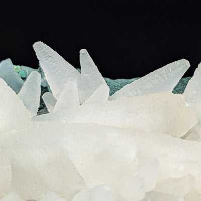 Macro view of Calcite crystal terminations against copper-oxide matrix