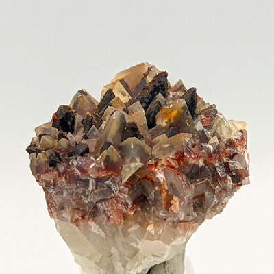 Full specimen of red and black double-generation calcite scalenohedra, Santa Eulalia, Mexico
