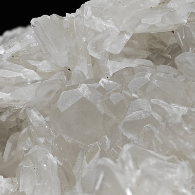 Close-up of colemanite crystal cluster showing transparency and luster