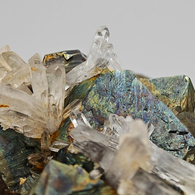 Side view of arsenopyrite crystals showing striations and quartz association