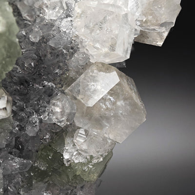 Side view of sharp Calcite crystals with granular Quartz matrix, Xianghualing specimen