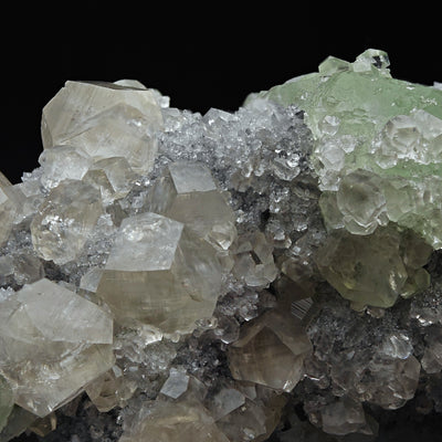 Close-up of Calcite crystal group with green Fluorite in background, Xianghualing Mine