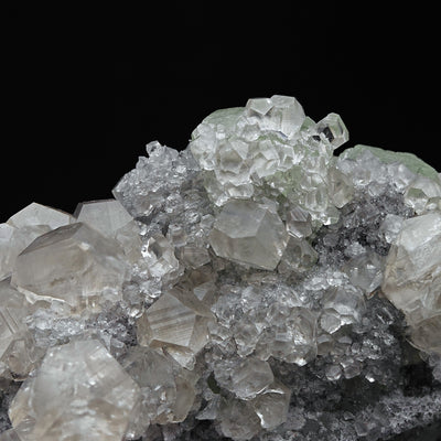 Detail of Calcite crystal cluster with green Fluorite edge and Quartz druse