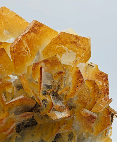 Close-up of hexagonal Calcite crystals with interior growth structures visible