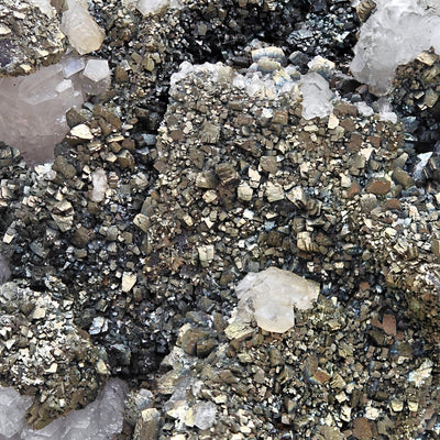 Macro view of golden Marcasite crystals with Calcite, Silius, Sardinia