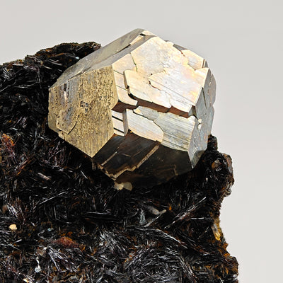 Detail of pyrite crystal faces with hematite crystals, Rio Mine, Italy