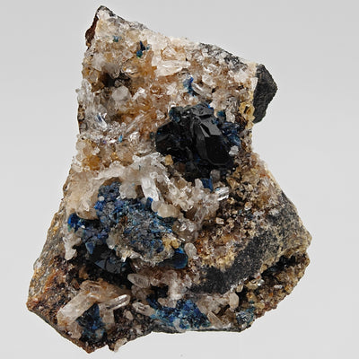 Full view of lazulite specimen on quartz and mica matrix, Rapid Creek, Yukon, Canada