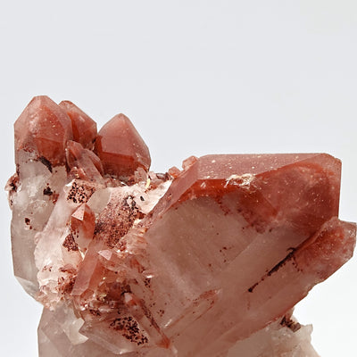 Detail of smaller hematoid quartz floater crystals clustered near main crystal, Orange River, South Africa