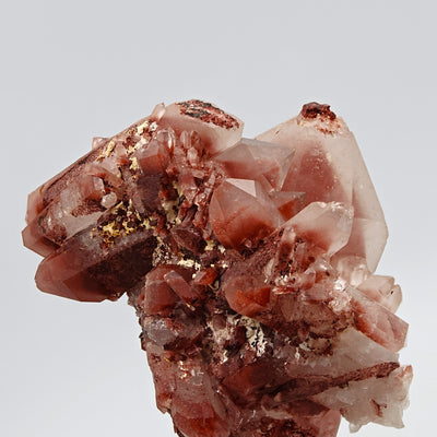 Detail of hematoid quartz crystal cluster showing golden mica flecks and hematite dusting, Orange River, South Africa