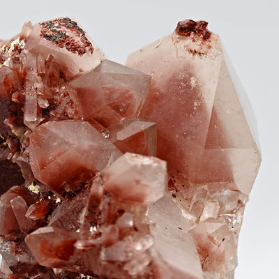 Close-up of hematoid quartz crystal points with reddish hematite inclusions, Orange River, South Africa