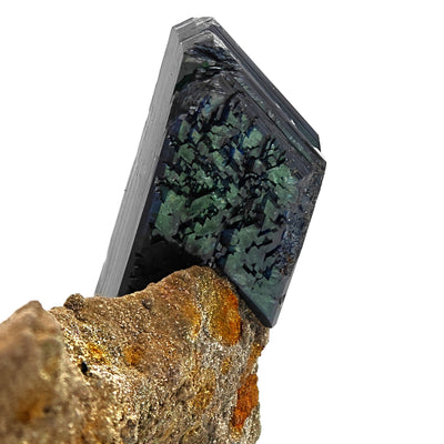 Termination detail of vivianite crystal showing green internal color zoning