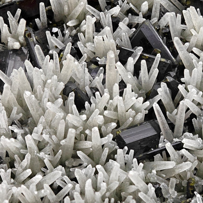 Dense quartz crystal sprays with epidote crystals beneath, Khowrin Mountain