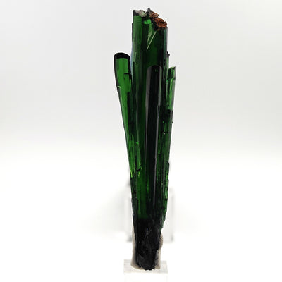Full view of a deep green vivianite crystal on display stand, São Gabriel da Cachoeira, Brazil