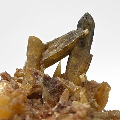 Side view of mimetite crossed crystals on druzy matrix, Tsumeb, Namibia