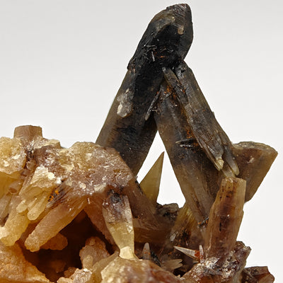 Angled view of mimetite crossed crystals showing matrix base, Tsumeb, Namibia