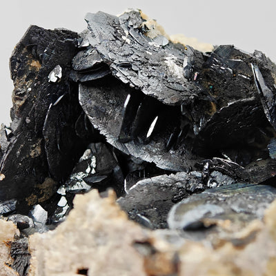 Macro detail of hematite crystal faces with magnetite on talc matrix, Orani, Sardinia