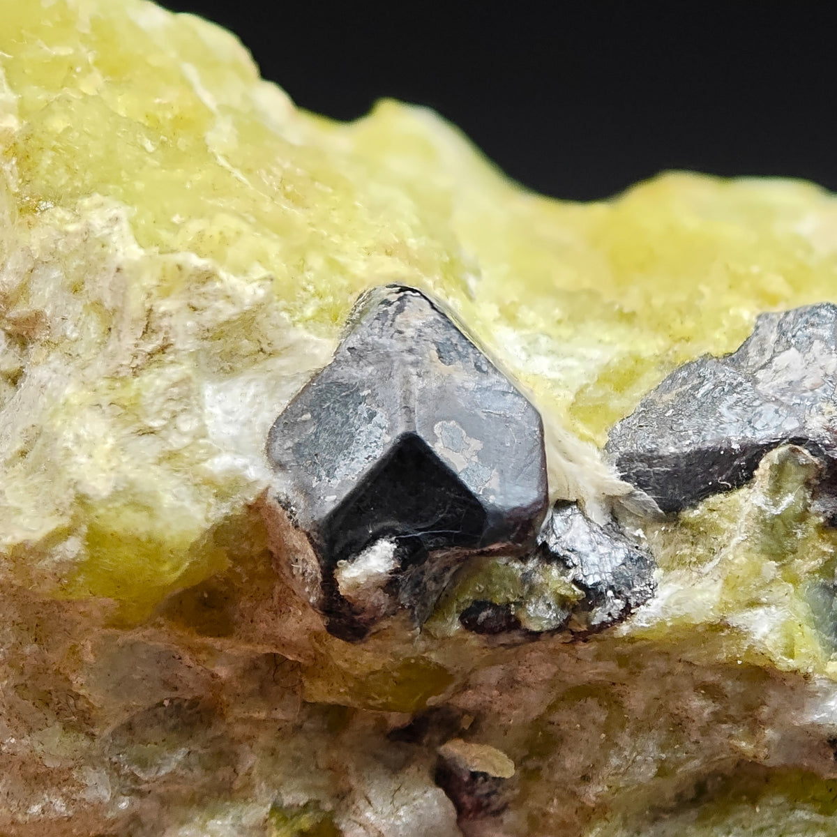 Close-up of a sharp octahedral Martite crystal after magnetite, Snarum, Norway