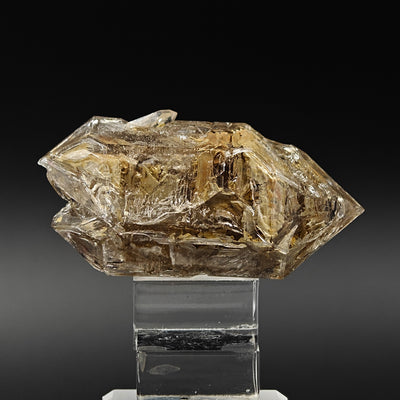 Full view of skeletal quartz crystal with recessed window-like facets, Rocchetta Nervina
