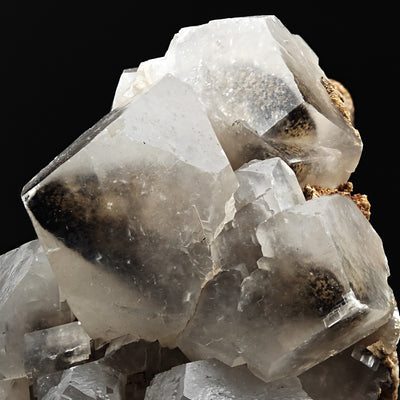 Close-up of calcite crystals with brown phantom inclusions, Sardinia, Italy