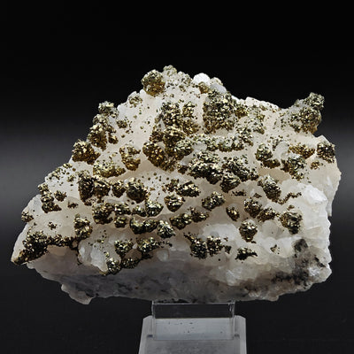 Marcasite on calcite specimen displaying snow-capped mountain pattern, Silius, Sardinia