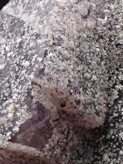 Close-up of Fluorite crystal edge with quartz druse and small pyrite inclusion