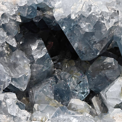 Close-up of light blue celestine crystals and terminations inside the geode