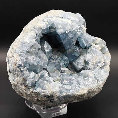 Full view of celestine geode on display stand, Sakoany deposit, Madagascar