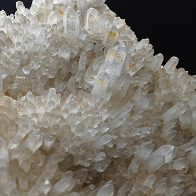 Close-up of quartz crystal terminations with natural iron oxide staining