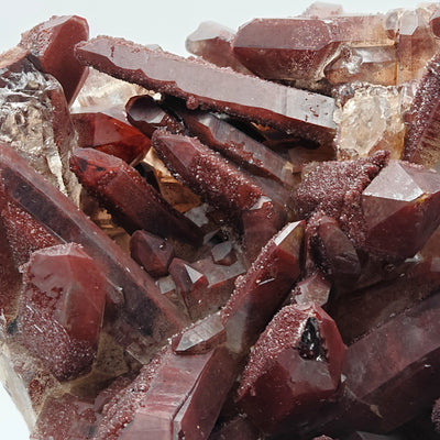 Detail of hollow and tabular hematoid quartz crystals with hematite dusting
