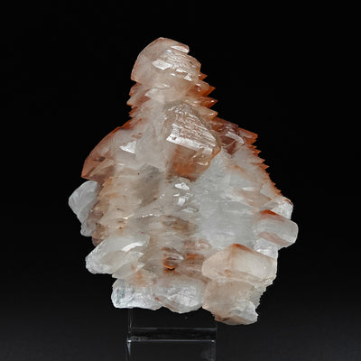 Calcite specimen displaying second-generation crystal overgrowth with hematite color, China