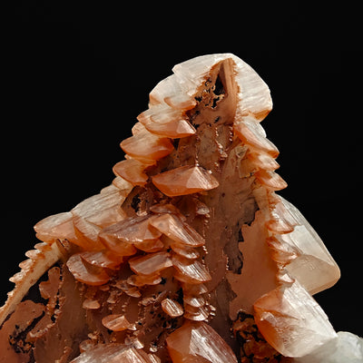 Detail of layered calcite terraces colored by hematite, Fengjiashan Mine, Hubei