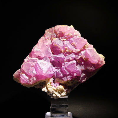 Full view of purple fluorite specimen on display stand from Durango, Mexico