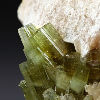 Close-up of elbaite tourmaline crystal cluster showing transparent gemmy faces