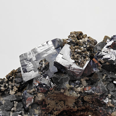 Detail of multiple Galena cube crystals with Calcite crystal clusters