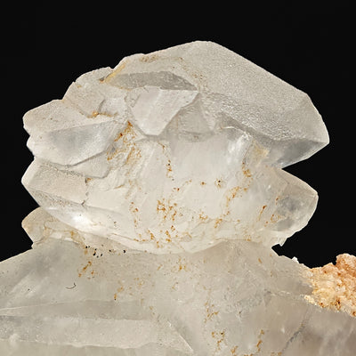 Close-up of glossy calcite crystal faces with twinning striations, Serrenti