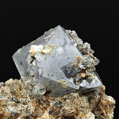 Close-up of quartz beta paramorph crystal showing clear bipyramidal faces